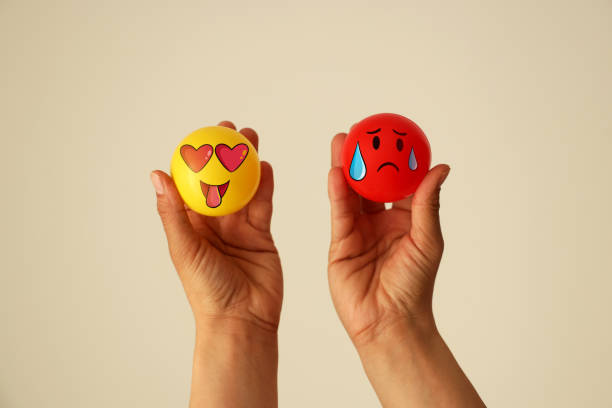 Woman holding emoji