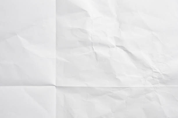 istock White folded and wrinkled paper texture background 1399276613