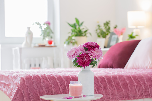 interior of bedroom with chrysanthemum flowers