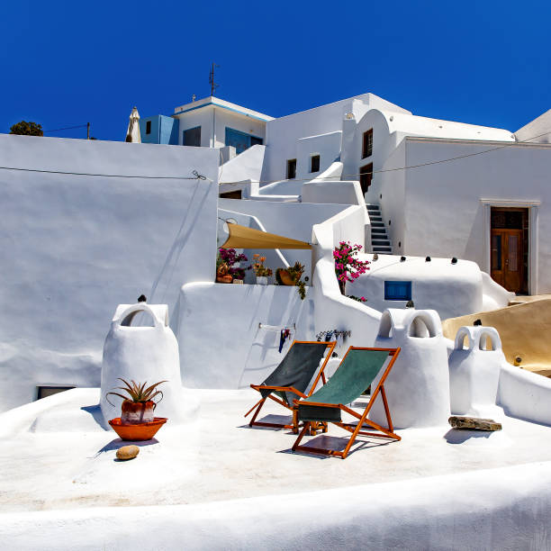 an entrance to a vacation apartment in Santorini / Greece against blue sky