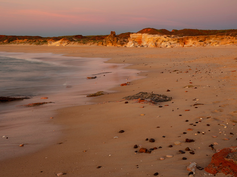 Long exposure beach sunset  at Barn Hill station Western Australia