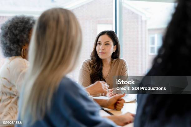 Adult Women Gather Together To Brainstorm Stock Photo - Download Image Now - Businesswoman, Active Seniors, Multiracial Group