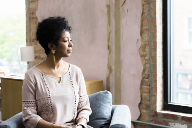 istock Mature woman spends time thinking at home or in office 1399285423