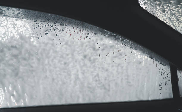 istock Car left mirror cleaning detail view from inside car 1399288867