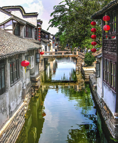 Zhouzhuang Ancient Chinese City with Canals Zhouzhuang Jiangsu Province China Ancient Chinese City Close to Suzhou with Canals water and reflections water town zhouzhuang china stock pictures, royalty-free photos & images