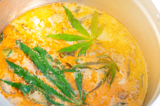 Thai curry with cannabis leaf
