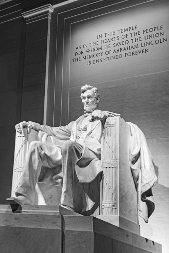 Black & White evening image of Abraham Lincoln in the Lincoln Memorial