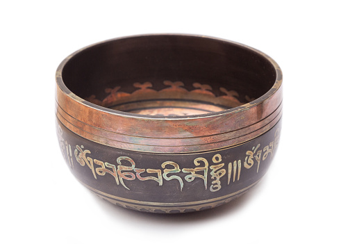 tibetan bowl in white background