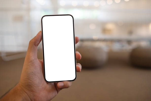 istock Mockup image of a man holding mobile phone with blank white screen in cafe 1399295186