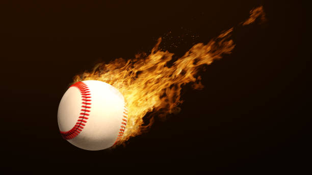 istock baseball Football on fire bright flame 1399296241