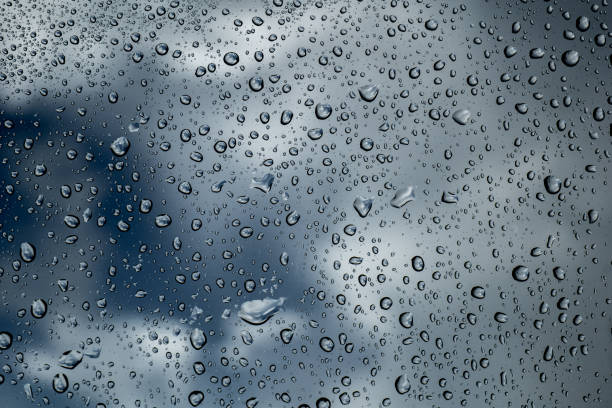 istock Rainy season concept, water drops texture background, abstract water drops texture. 1399305136
