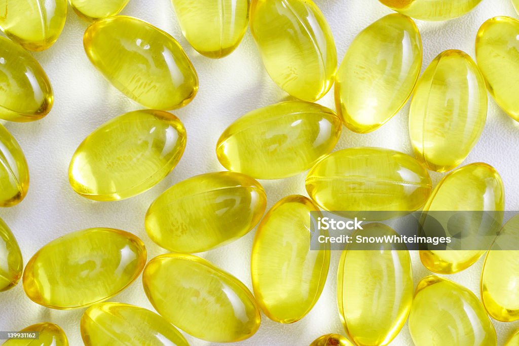 capsules d'Huile de foie de morue - Photo de Complément vitaminé libre de droits