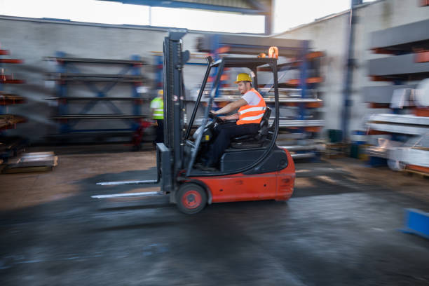 forklift trucks transported in a warehouse - storage of goods in a forwarding agency