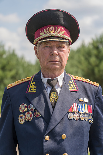 Slavuta, Ukraine - august 01, 2021 : Old general of army of Ukraine take part in the Ethno-eco festival Kolodar in the city of Slavuta, Ukraine