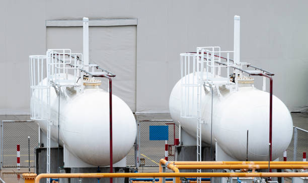 istock Two white fuel oil tanks 1399319231