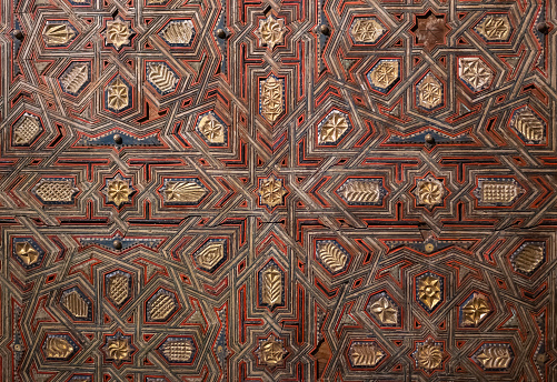 Traditional Moroccan mosaic pattern, cut out of colourful  pieces of ceramic tiles