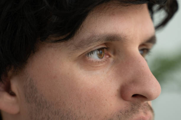 istock Extreme close-up of a man's eyes looking sideways 1399320126