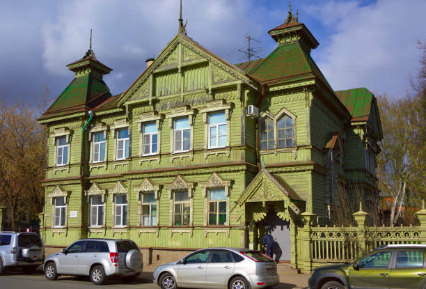 Kostroma, Russia, 05.07.2022: Wooden house on Simanovsky 14. Old house in the Old Russian decorative style