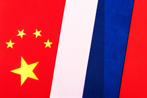 Fragments of Russian and Chinese flags