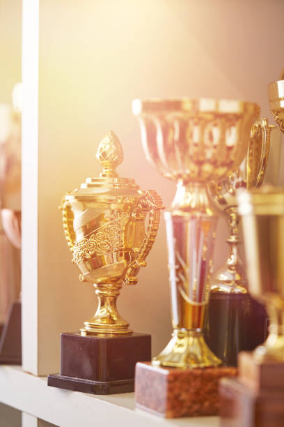 istock Group of trophies on shelf. 1399326541