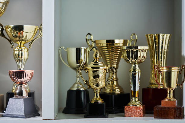 istock Group of trophies on shelf. 1399326548