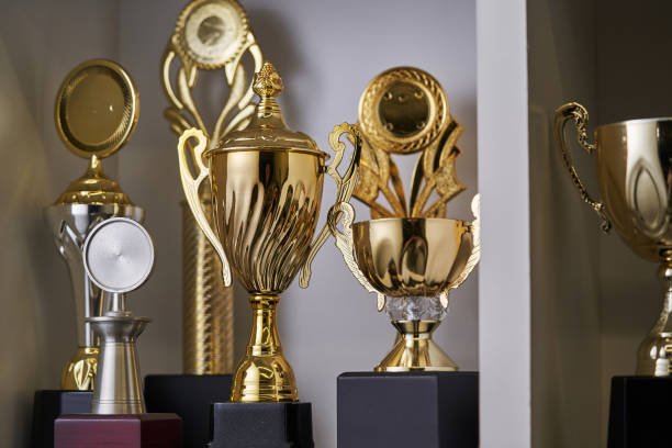 istock Group of trophies on shelf. 1399326549