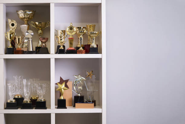 istock Group of trophies on shelf. 1399326574