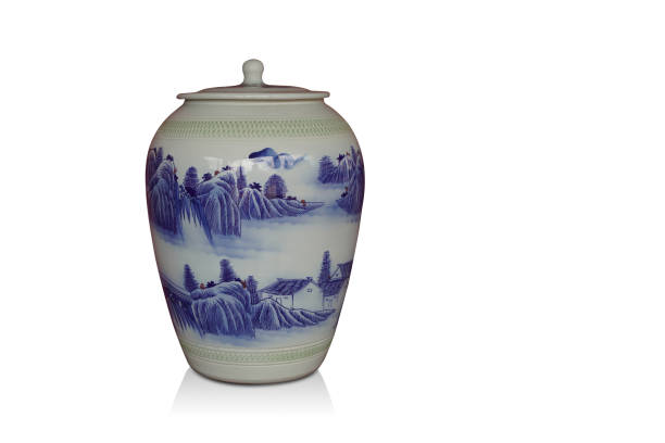 istock beautiful white and blue, green ceramic lid on ceramic pot on white background, object, vintage, copy spac 1399326835