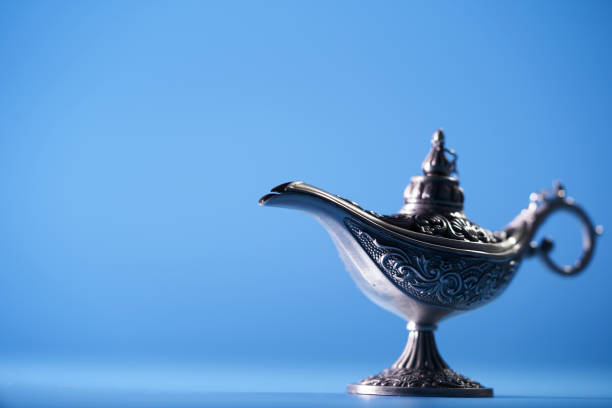 istock close up alladin magic lamp against blue background 1399326847