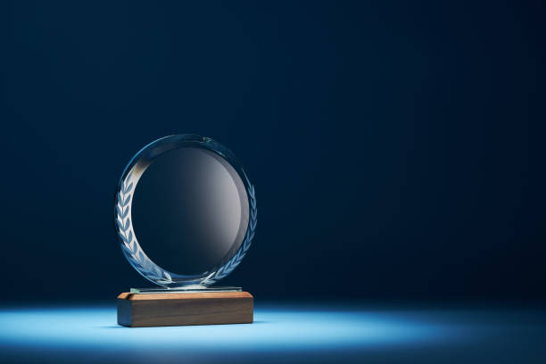 istock crystal trophy against blue background with copy space 1399327098