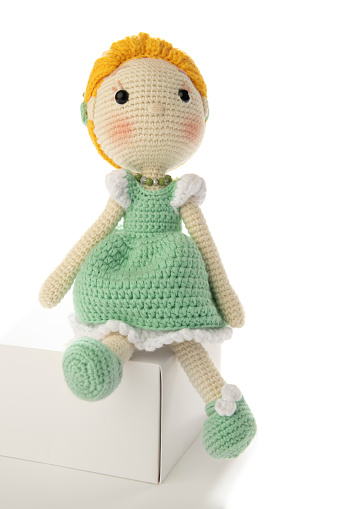 Amigurumi crochet doll isolated on white background