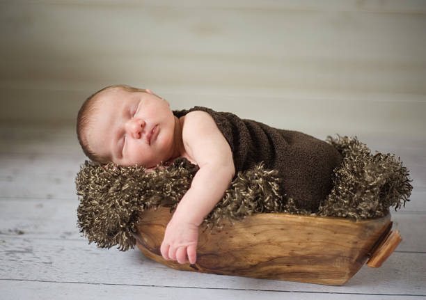istock Newborn Sleeping in Trench Bowl 139933210