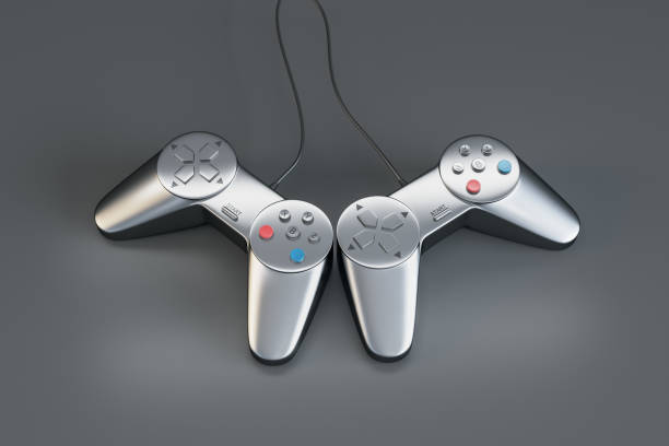 istock Gaming and partner entertainment concept with two silver modern joysticks on abstract grey backdrop. 3D rendering 1399334674