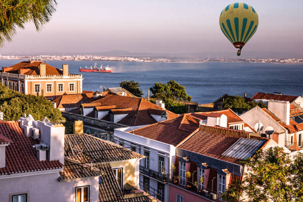 Colors and street art in the Escadinhas de São Cristóvão, located right in the historic center of Lisbon, a place of passage for Lisbon residents, but a place to admire murals and traditions for tourists