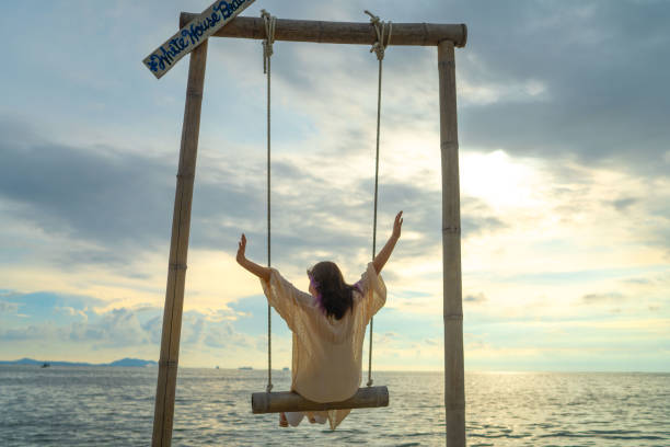 istock Young woman having fun with the sea. 1399337305