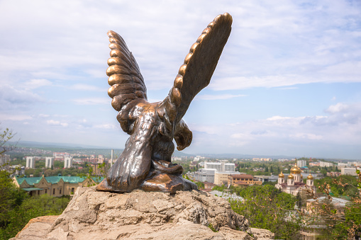 Pyatigorsk, Russia - May 10, 2022: Bronze eagle on top of the mountain - a symbol of Pyatigorsk and Caucasian Mineralnye Vody, Russia