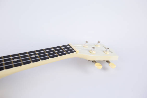 istock strings of a beautiful white guitar close-up on a white background ukulele 1399339822
