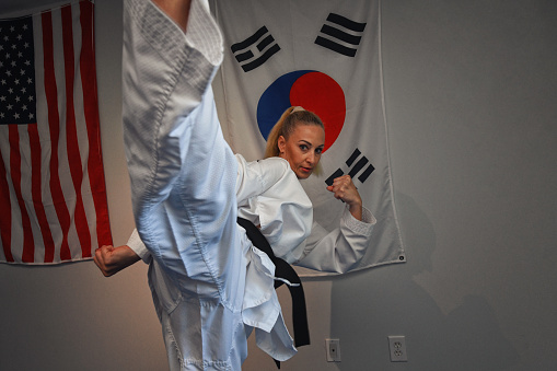 Martial artist training in her dojang.