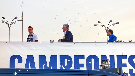Madrid, Spain; 04-30-2022: Carlo Ancelotti walking behind Toni Kroos on a platform installed to celebrate Real Madrid's league title in Plaza de Cibeles
