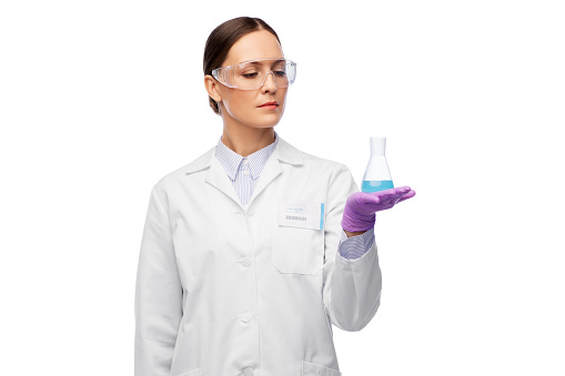 Beautiful Female Scientist Using Micro Pipette for Test Analysis