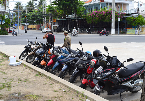 Nha Trang, Vietnam - 16 May 2022: toll motorbike parking in Nha Trang