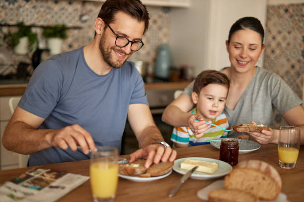 istock Parents spending some quality time with their adorable son at breakfast time 1399344751