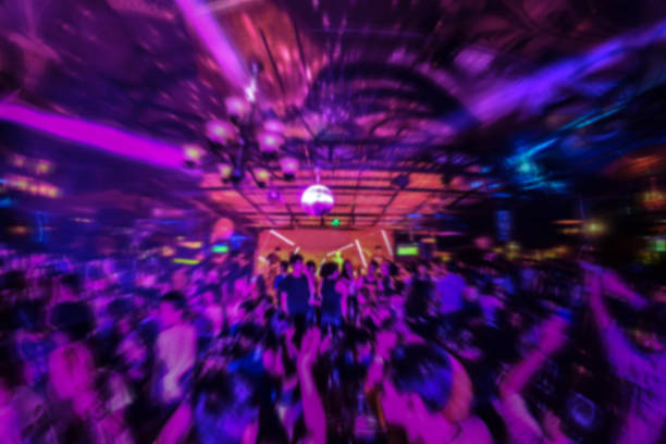 istock De-focused or blurred concert crowd enjoying the music. 1399349928