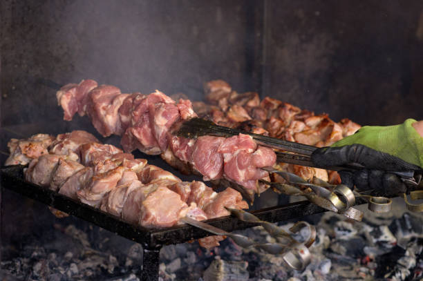 istock Meat kebabs on flaming grill 1399350309