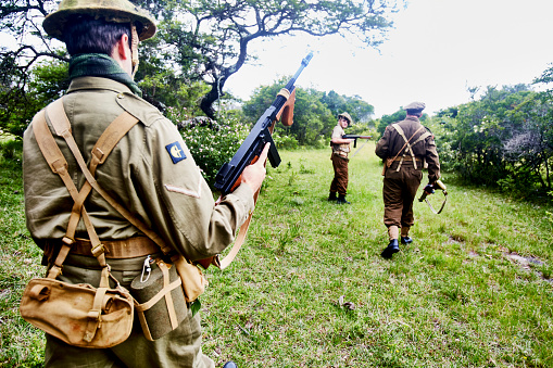 Gonubie public park, East London, Eastern Cape, South Africa - 5 December 2020. Preparations and rehearsal for an Airsoft championship which will include 60 people from around South Africa. This faction is an English faction who will be playing against German and American teams in a World War 2 re-enactment. Air-soft is a safe form of pellet shooting which causes no bodily harm or stains to uniform.