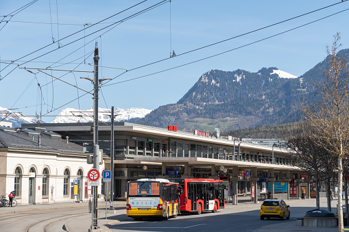 Chur, Switzerland, April 11, 2022 Buses in front of the main train station in the city center