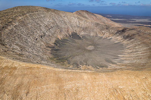 Flying over Montana Blanca volcanic crater, Lanzarote