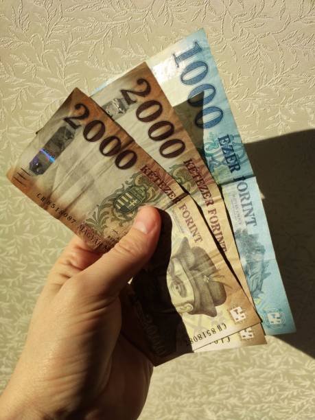 istock Hungarian Forint banknotes in a person's hand 1399359301