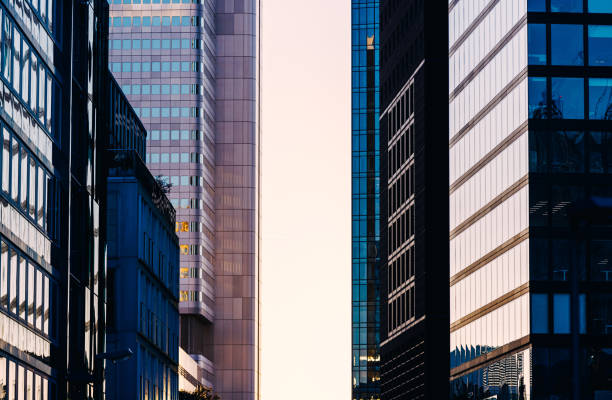 istock View on corporate buildings with windows reflecting sunlight, downtown district in Frankfurt 1399359916