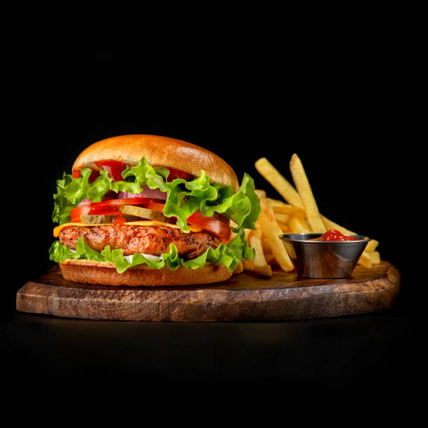 istock Delicious burgers with beef, tomato, cheese and lettuce 1399360594